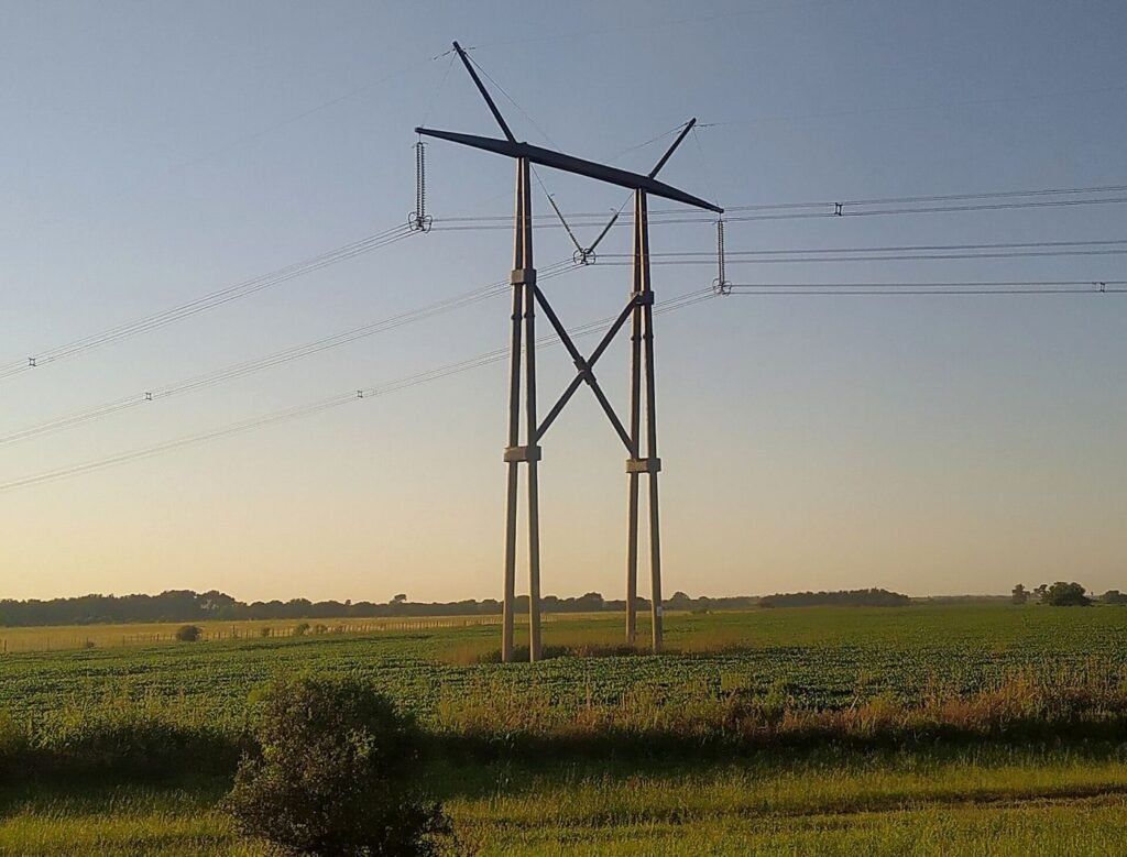 Electricity pylons at sunset